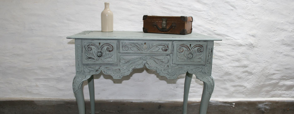 Pedran hand painted Rustic carved table or Lowboy